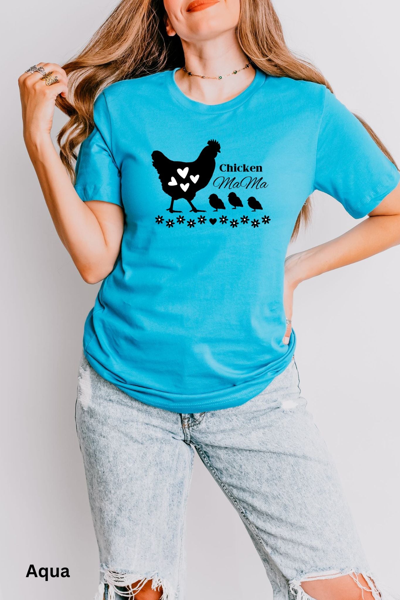 Aqua Chicken Mama t-shirt featuring a hen with baby chicks and flowers, perfect for homesteaders, backyard chicken keepers, and farm life lovers.