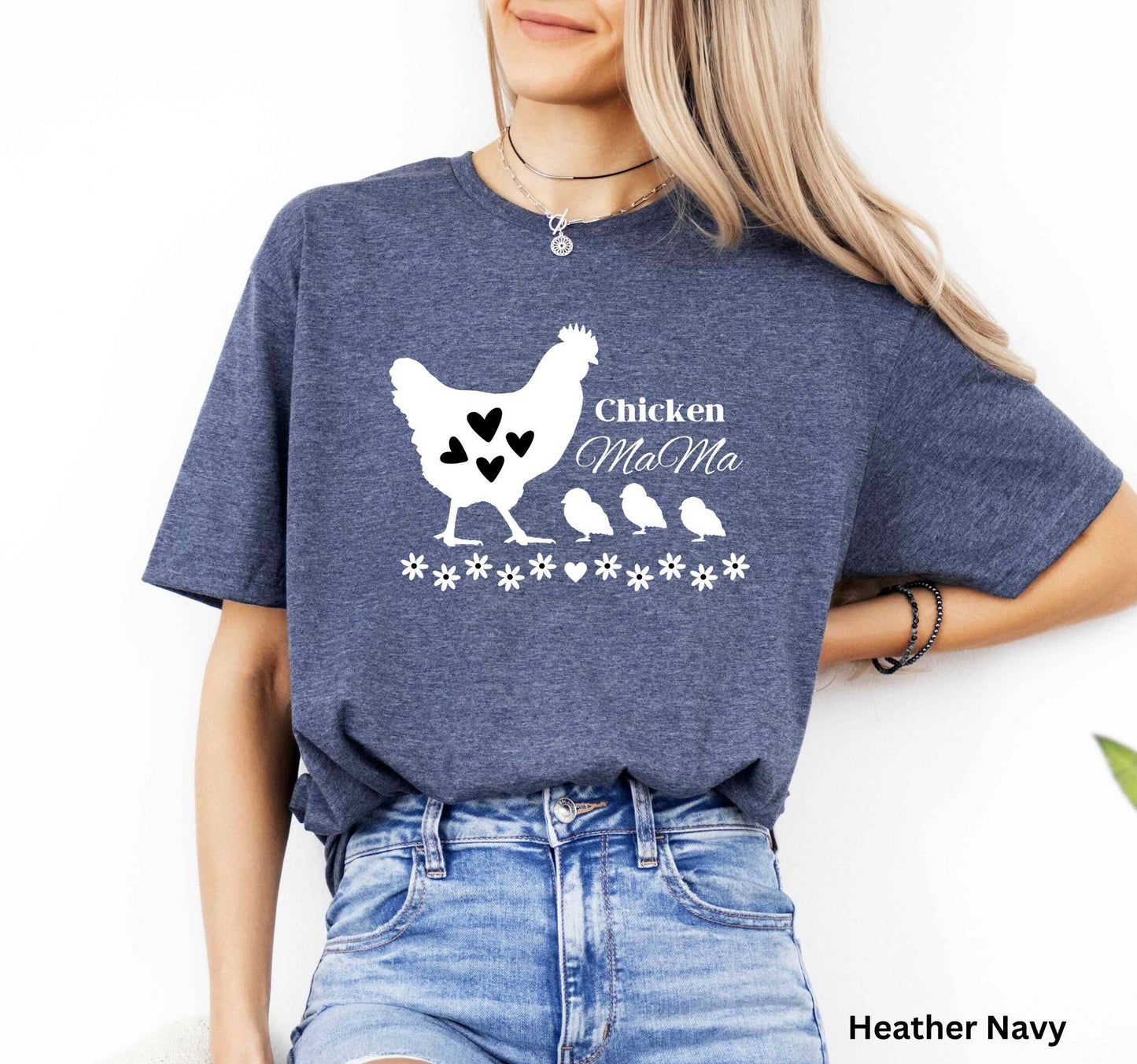 Navy Chicken Mama t-shirt featuring a hen with baby chicks and flowers, perfect for homesteaders, backyard chicken keepers, and farm life lovers.