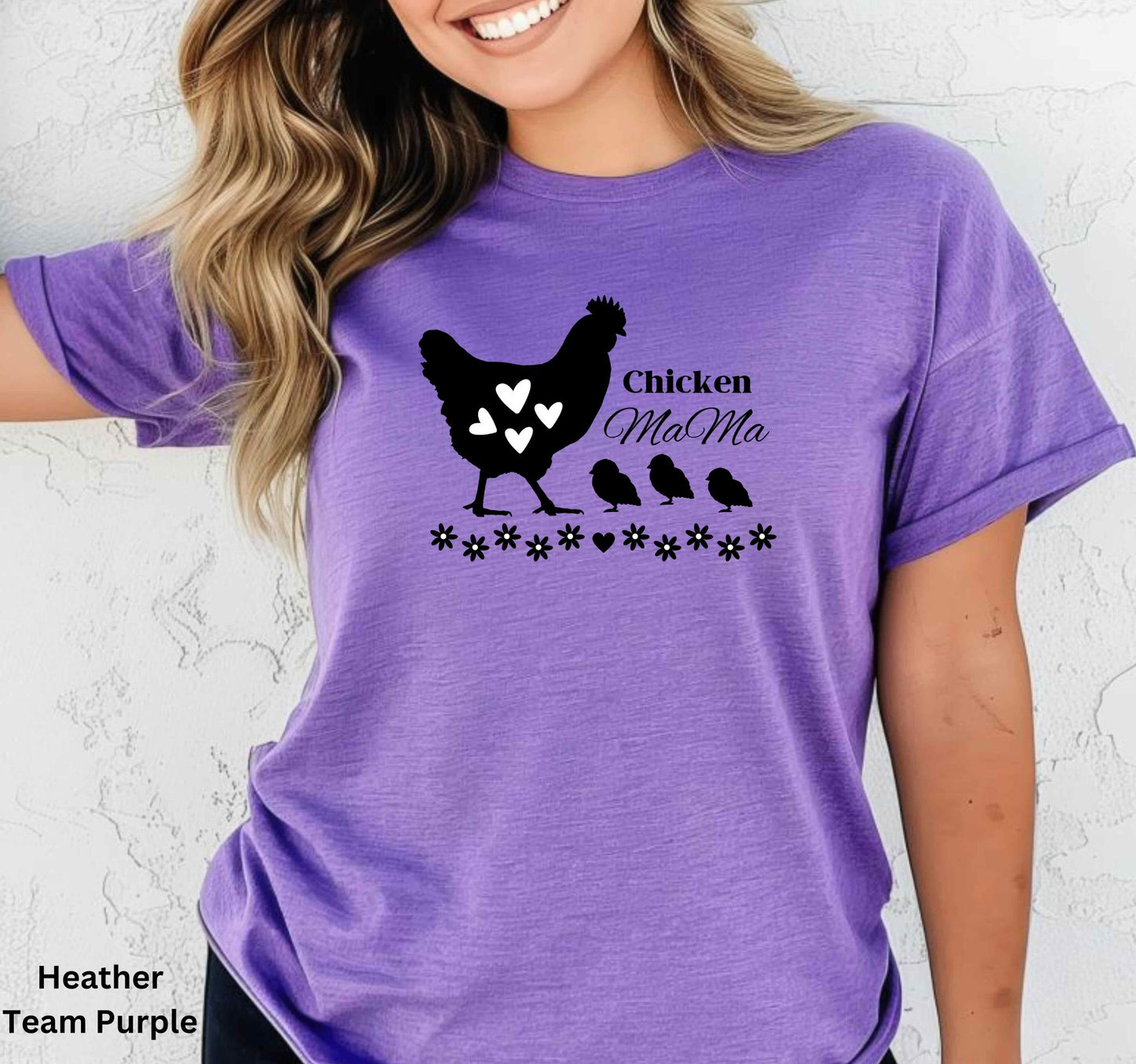 Purple Chicken Mama t-shirt featuring a hen with baby chicks and flowers, perfect for homesteaders, backyard chicken keepers, and farm life lovers.