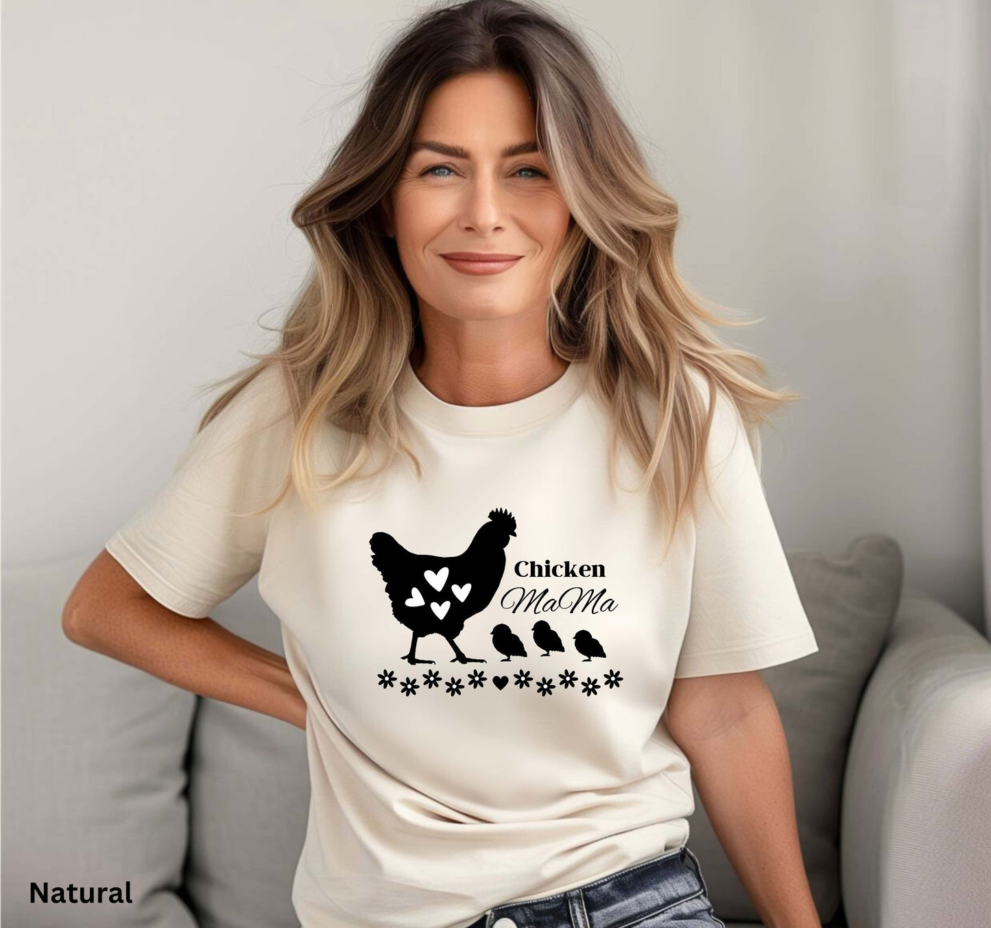 Chicken Mama t-shirt in natural color featuring a hen with baby chicks and flowers, perfect for homesteaders, backyard chicken keepers, and farm life lovers.
