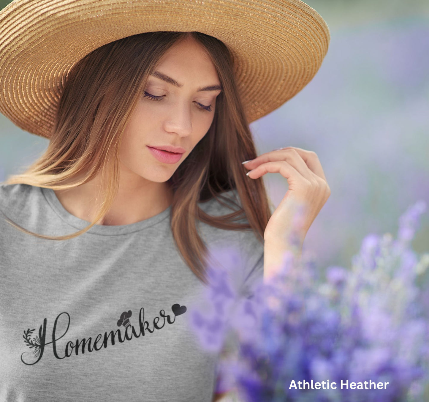 Light grey homemaker t-shirt with floral design, chef’s hat over the 'A,' and heart accent, perfect for homesteaders, homebakers, and simple living enthusiasts.