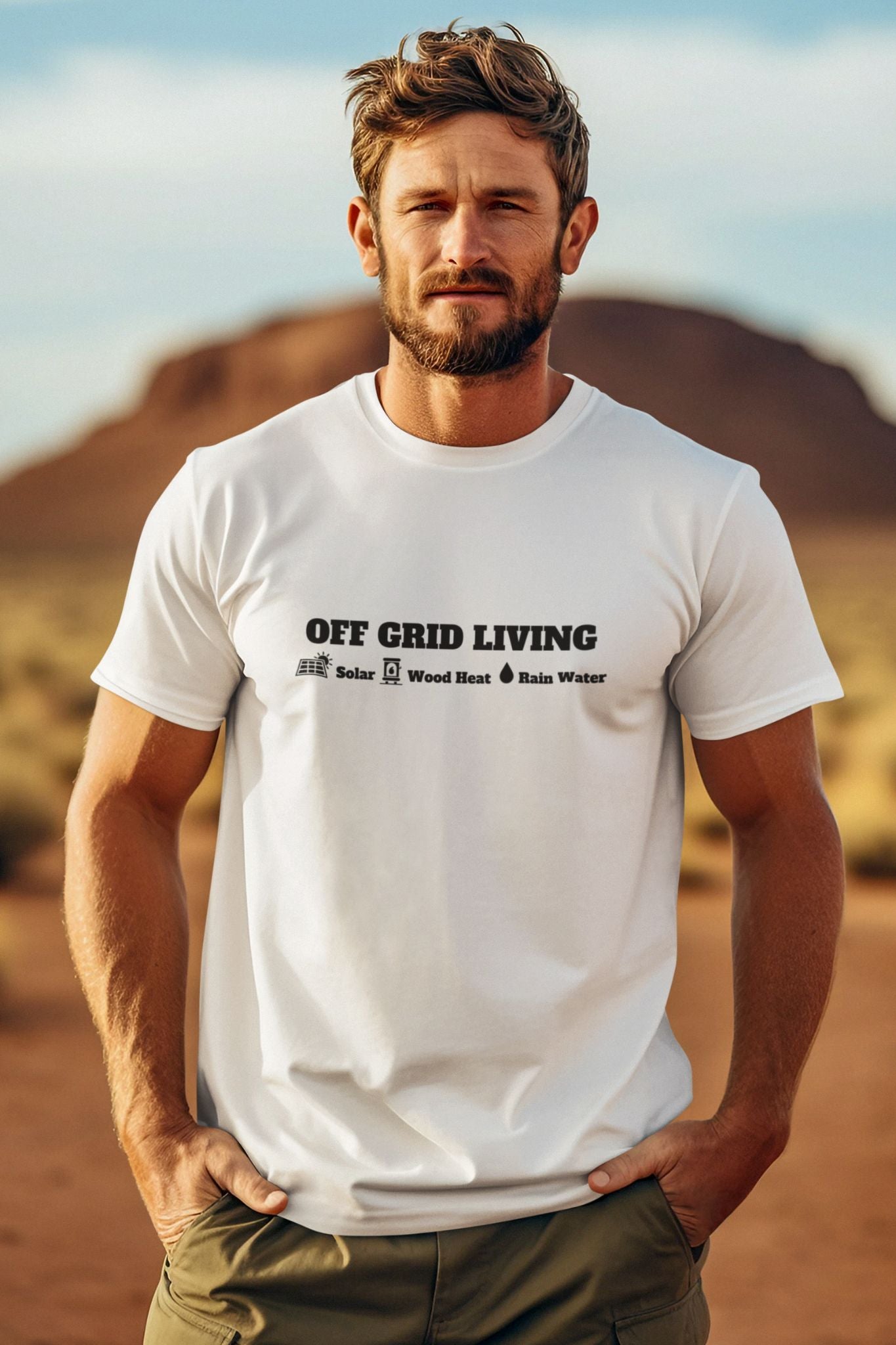White Off Grid Living t-shirt featuring the words 'Off Grid Living' with icons representing solar power, wood heat, and rainwater—perfect for self-sufficiency and sustainable living.