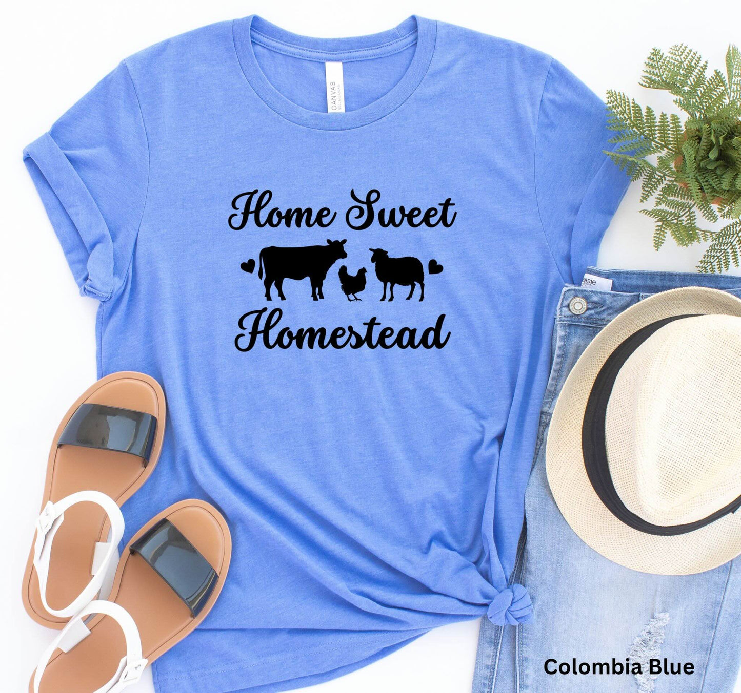 Home Sweet Homestead blue t-shirt with cow, sheep, and chicken design, perfect for homesteaders, farmers, and country living enthusiasts.