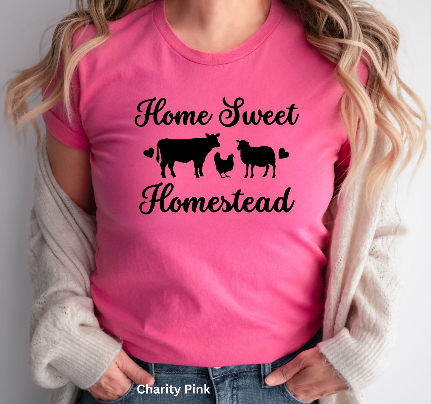 Home Sweet Homestead pink t-shirt with cow, sheep, and chicken design, perfect for homesteaders, farmers, and country living enthusiasts.